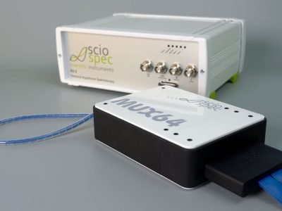 Modular bioimpedance setup with Sciospec ISX-3 and MUX system for high-throughput, multi-channel measurements.